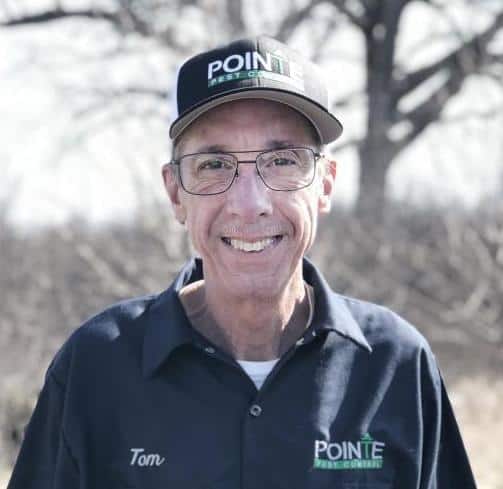 Pointe Pest Control Technician smiling at the camera